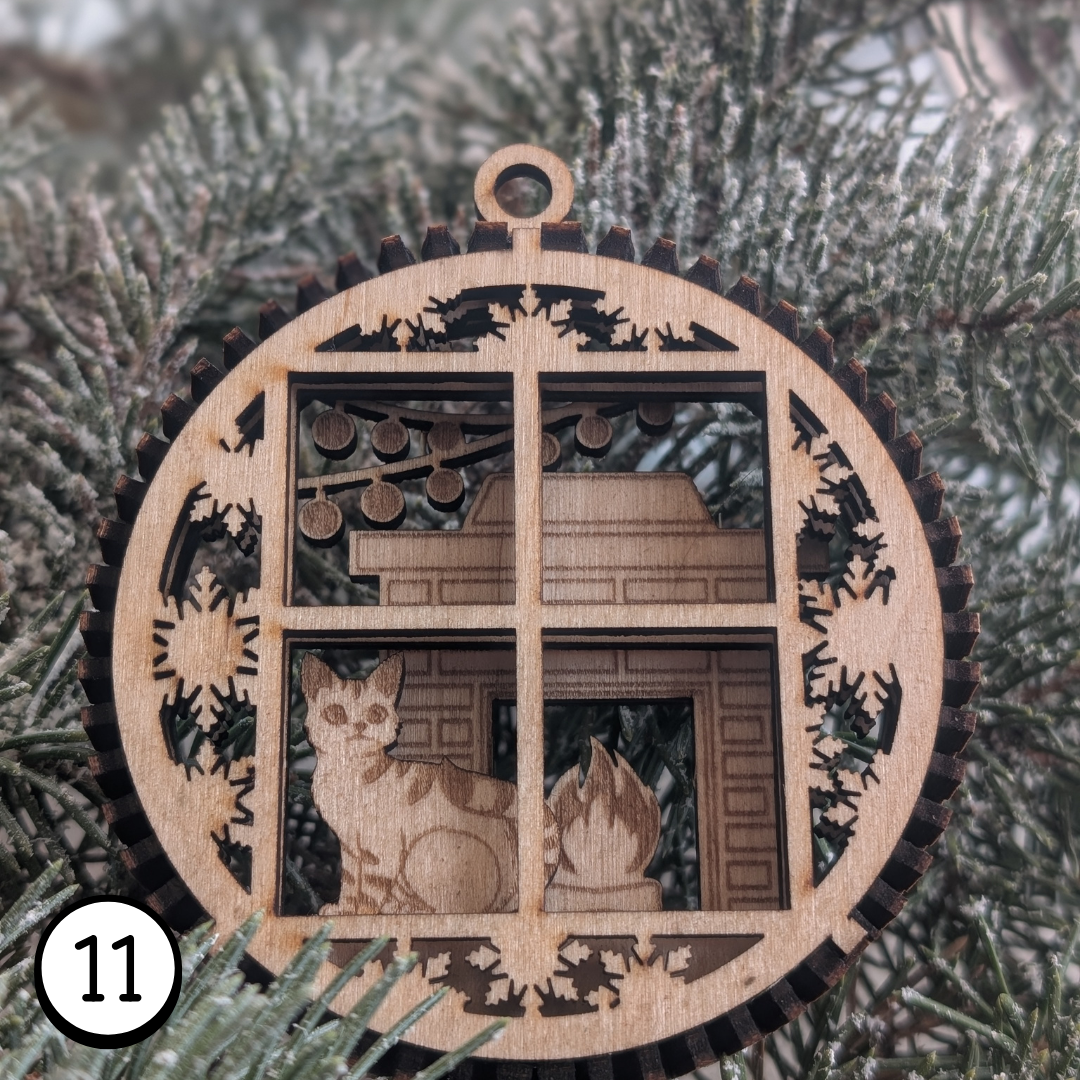 Scène d'un chat sur le bord d'une fenêtre des flocons qui tombe.